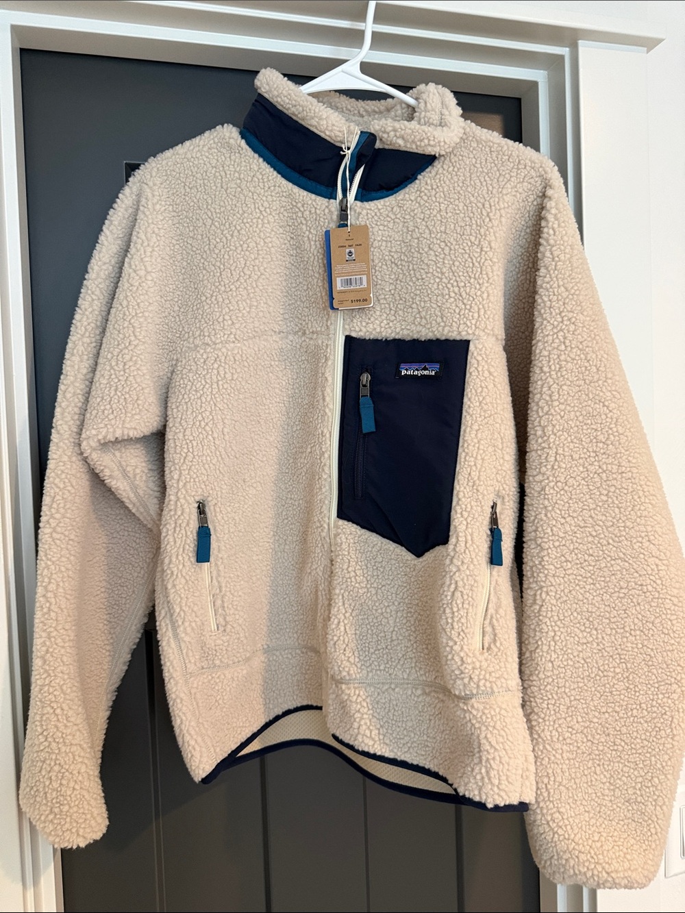 Patagonia Kids Cream Sherpa Fleece Jacket with Navy Pocket Accents